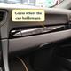 Illustration for article titled The Needlessly Complicated Cupholders in the Porsche 911 Are Awesome